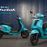 Bajaj Chetak electric scooter 2026 green color riding on road